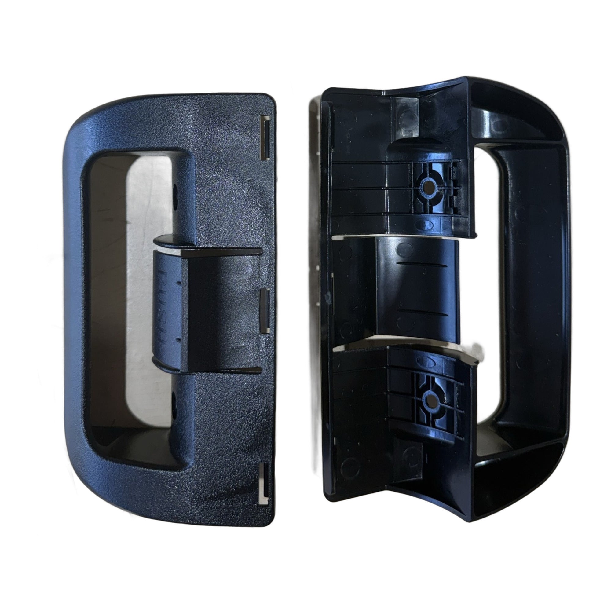 Dometic 38511740311 door handle pair showing the internal latch cams and two screw bosses on the back of each handle