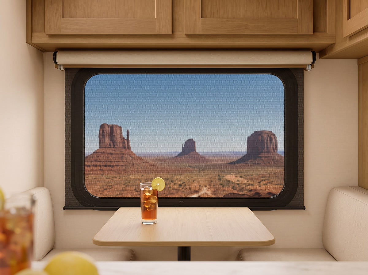 RV day/night shade with solar screen down, Monument Valley visible without glare